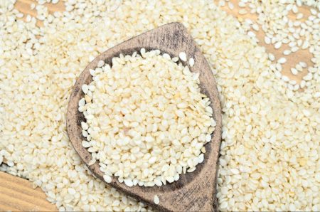 white sesame on wooden table